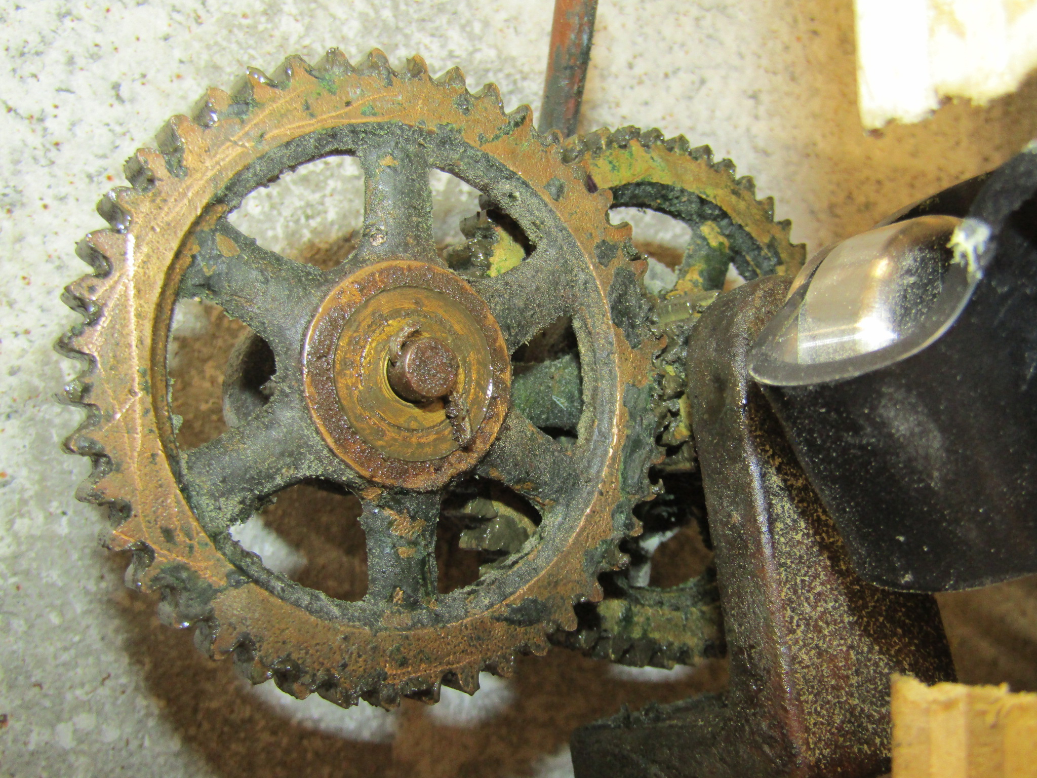 Bells inside the bell tower, above the clock face gear systems.