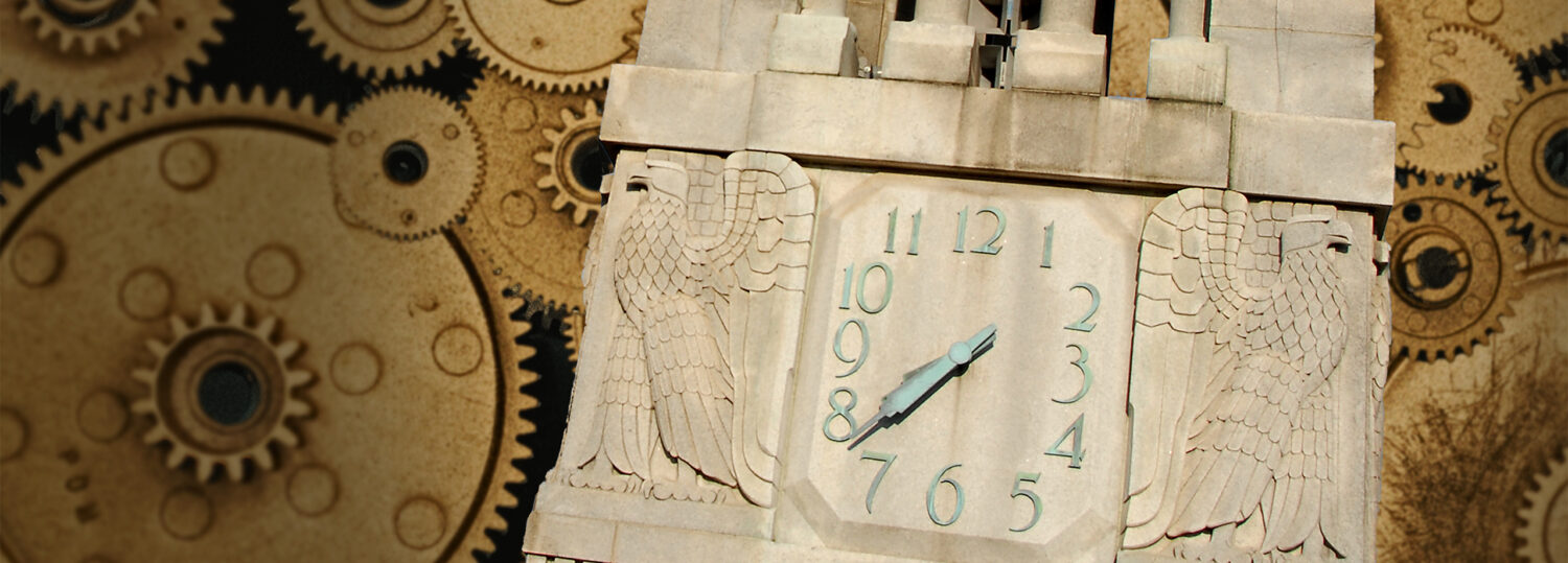 NC State Belltower on a backdrop of golden gears.